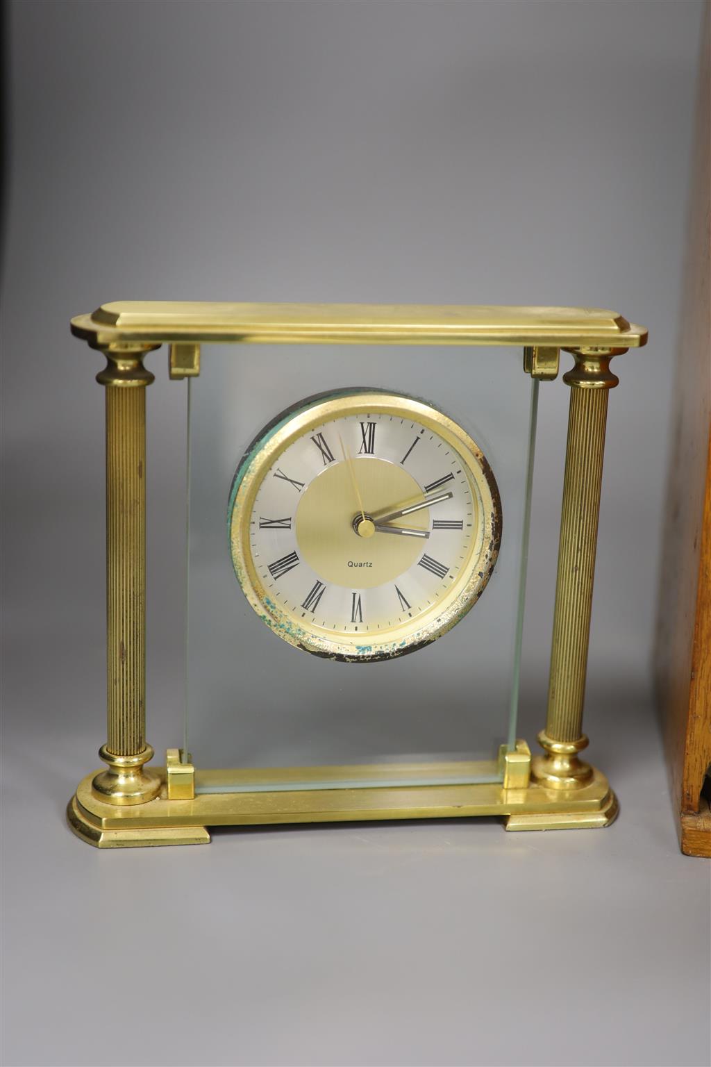 An oak-cased black japanned microscope, case 35cm high, width 16cm, 20cm depth and a brass mantel timepiece